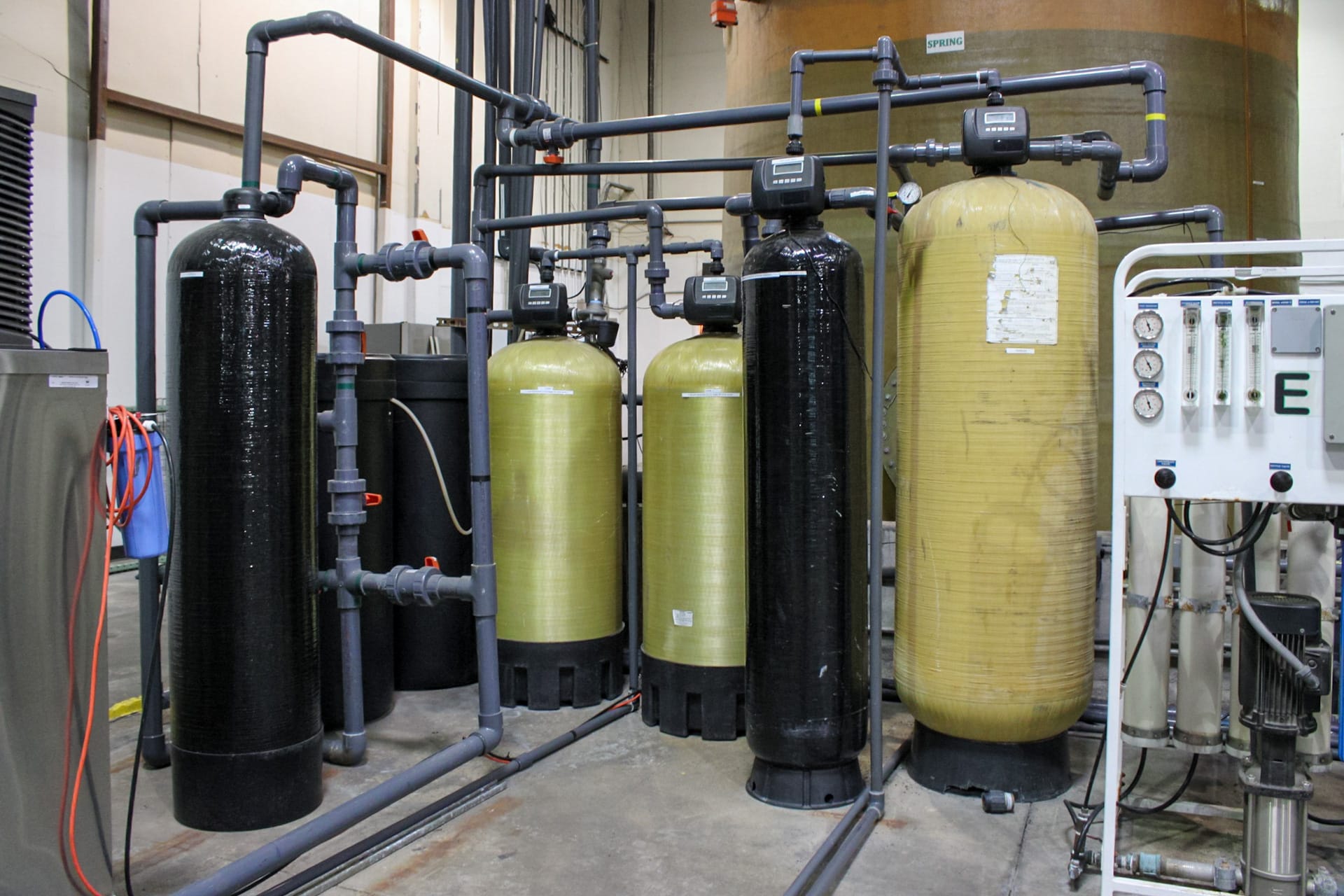 A complex water filtration system for a commercial space, installed by Texas Water House.